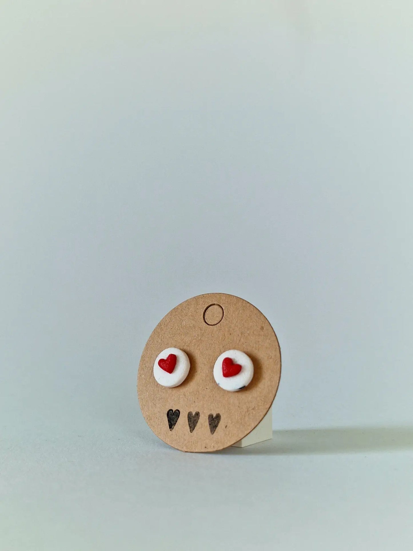 "Tiny red heart badge" earrings