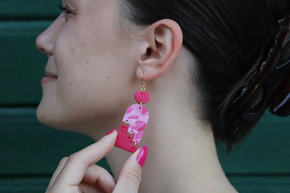 "Staggering pink tombstones" earrings