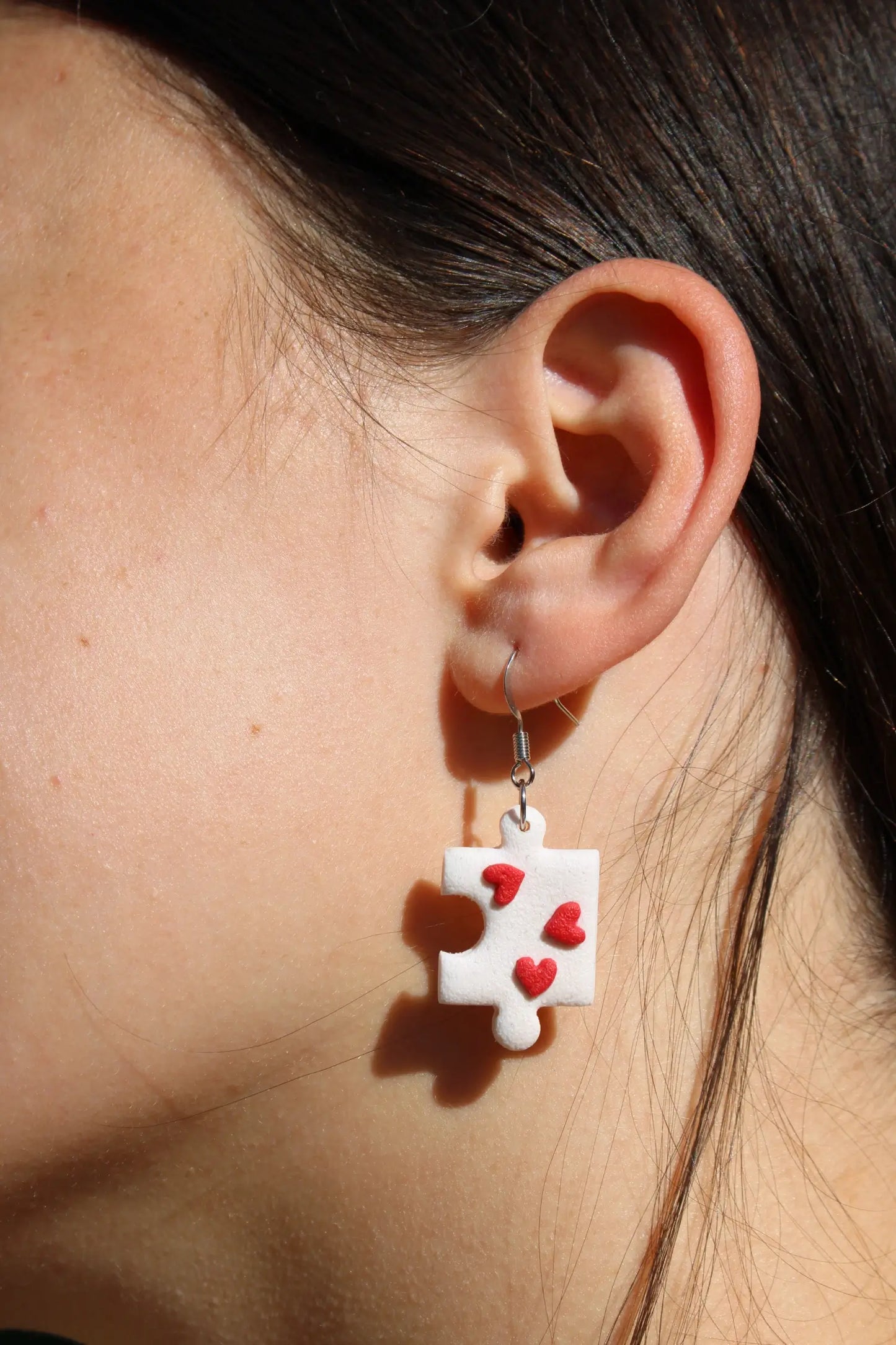 "Cupid's puzzle piece" earrings